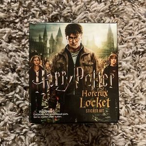 Salazar Slytherin’s locket/ Voldemort’s horcrux locket and sticker book